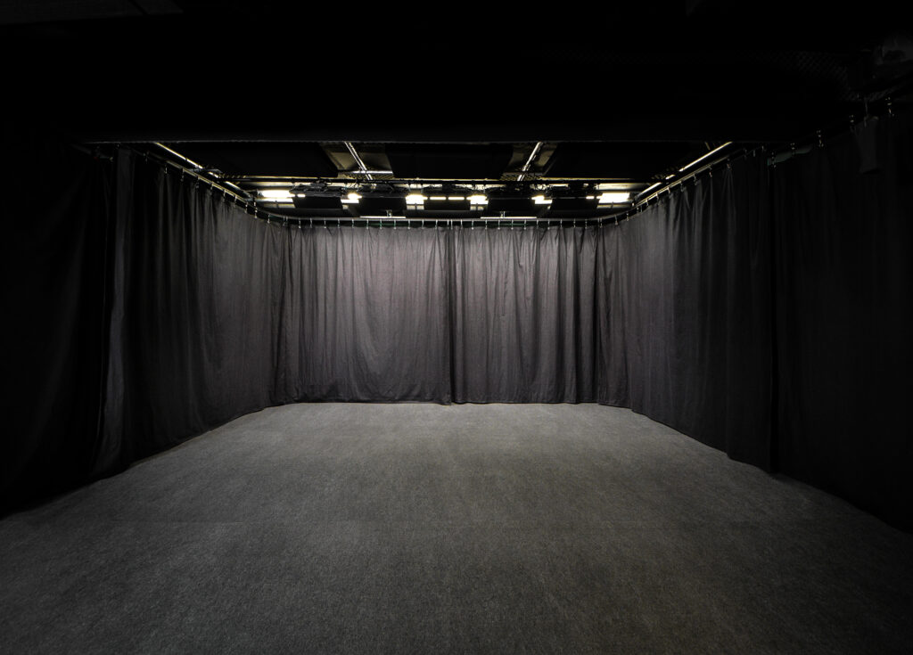 Blackout studio empty space with curtains