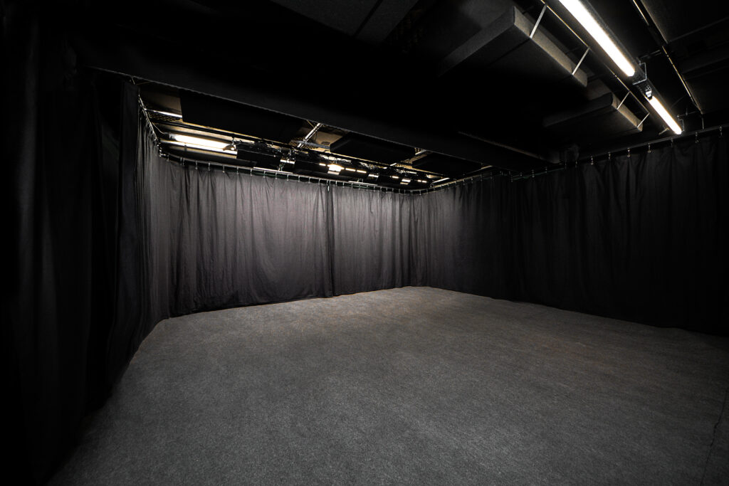Blackout studio empty space with curtains