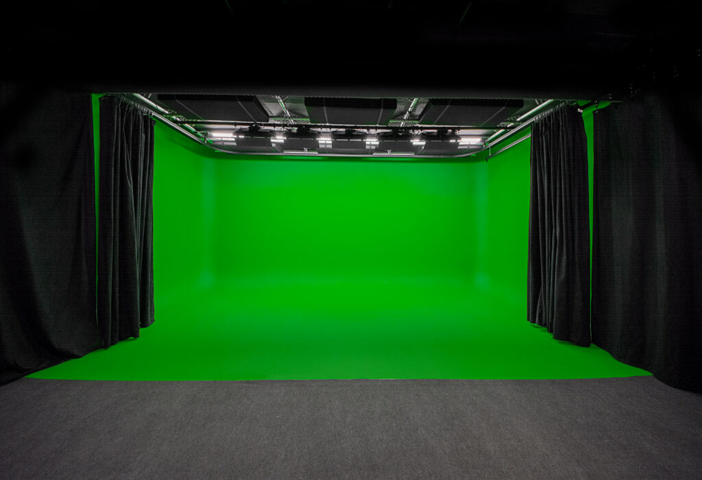 Green Screen chromakey studio empty space with curtains
